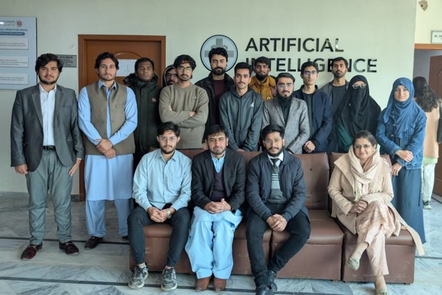 Members and faculty at the Artificial Intelligence department